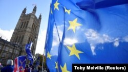 Ұлыбритания парламенті алдындағы Brexit-ке қарсылардың шеруі. Лондон, 13 қараша 2018 жыл (Көрнекі сурет).