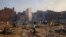 INDIA -- Funeral pyres of people, who died due to the coronavirus disease (COVID-19), are pictured at a crematorium ground in New Delhi, India, April 22, 2021. REUTERS/Danish Siddiqui