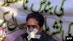 FILE: A Pakistani journalist protests curbs on free press.