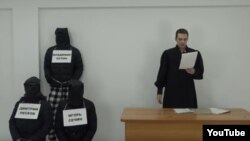 A scene from the YouTube video that landed Karim Yamadayev in hot water.