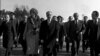 FILE - In this Jan. 16, 1979 file picture, Shah Mohammad Reza Pahlavi and Empress Farah walk on the tarmac at Mehrabad Airport in Tehran to board a plane to leave Iran.