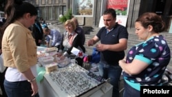 Armenia - Syrian Armenians sell their handmade products at a fair in Yerevan, 20May2014.