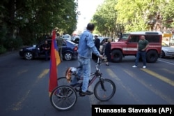 Supporters of opposition lawmaker Nikol Pashinian block a street in central Yerevan on May 2.