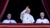 Pope Francis (center) delivers the traditional Urbi et Orbi Christmas Day blessing from the central balcony of St. Peter's Basilica in the Vatican on December 25.