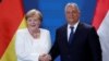 Cancelara germană Angela Merkel şi premierul ungar Viktor Orban vizitând oraşul de frontieră din Ungaria Sopron. 19 august 2019