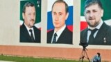 Плакаты на трибуне ипподрома в Гудермесе. Чечня. Архивное фото