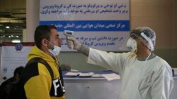 په کابل کې پر هوايي‌مېدان د يو تن تبه کتل کېږي