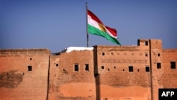 Իրաք - Քրդական ինքնավարության դրոշը Էրբիլի միջնաբերդի վրա, արխիվ