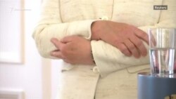 Меркель снова задрожала на публике