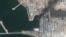 A satellite view shows destroyed naval vessels and buildings after U.S. and Israeli strikes, at Konarak