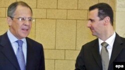 Министр иностранных дел России Сергей Лавров (слева) и президент Сирии Башар Асад