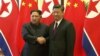 CHINA -- Chinese President Xi Jinping (R) and North Korean leader Kim Jong Un meet in Beijing, March 27, 2018