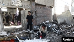  پس از حمله بر یک منطقه در تهران، عکس از خبرگزاری رویترز