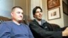 U.S. Army Captain Matt Zeller (left) with translator Janis Shenwari, whom he credits for saving his life in Afghanistan in 2008, during an interview in 2013 in Arlington, Virginia, after Shenwari received a special immigrant visa.