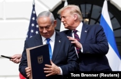 Donald Trump, în timpul unei vizite din 2020 în care s-a întâlnit cu Beniamin Netanyahu, premierul Israelului – țară cu care Iranul se află în conflict.