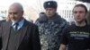 Armenia - Opposition presidential candidate Paruyr Hayrikian (L) arrives at a news conference in Yerevan, 5Feb2013.