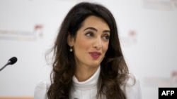 U.K. -- Barrister Amal Clooney attends a press conference in London, October 5, 2015