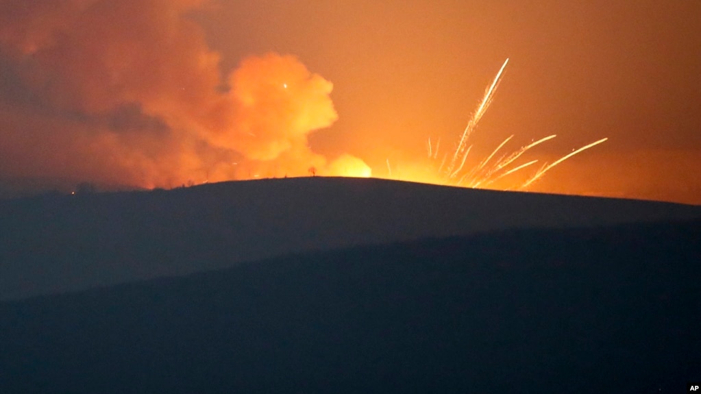 Explosions in the mountains during fighting between Armenian and Azerbaijani forces outside Stepanakert, in the breakaway region of Nagorno-Karabakh.