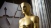 U.S. -- (FILES) In this file photo taken on February 08, 2020 an Oscars statue is displayed on the red carpet area on the eve of the 92nd Oscars ceremony at the Dolby Theatre in Hollywood, California.