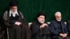 Former Qods Force's Qassem Soleimani (R), Iranian Supreme Leader Ayatollah Ali Khamenei (L) and Iraqi Shia cleric, politician and militia leader Muqtada al-Sadr in Tehran, Sept. 10, 2019 - FILE