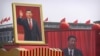  Величезні портрети президента Китаю Сі Цзіньпіна під час параду з нагоди 70-ї річниці заснування комуністичного Китаю. Пекін, Китай. 1 жовтня 2019 року 