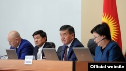Kyrgyz Prime Minister Sooronbai Jeenbekov, second from right, and members of the government.