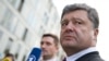 Ukrainian presidential frontrunner Petro Poroshenko gives a statement to the media earlier this month. A new report has given qualified approval to the press's coverage of the presidential election campaign. 