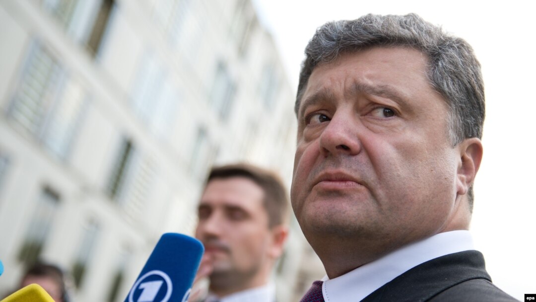 Ukrainian presidential frontrunner Petro Poroshenko gives a statement to the media earlier this month. A new report has given qualified approval to the press's coverage of the presidential election campaign. 