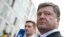 Ukrainian presidential frontrunner Petro Poroshenko gives a statement to the media earlier this month. A new report has given qualified approval to the press's coverage of the presidential election campaign. 