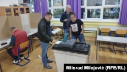People voting at a polling station in Banja Luka on October 4 