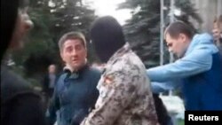 Adjunctul primarului din Horlivka, Volodimir Ribak, răpit de separatiști pe 17 aprilie, 2014, inainte de a fi torturat și ucis.