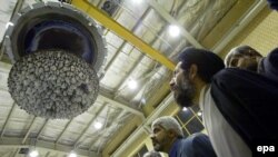 Iranian lawmakers inspect parts of the nuclear plant in Isfahan, a uranium conversion facility.