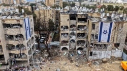 تصویری که روز ششم شهریور با استفاده از پهپاد از ویرانی‌های ناشی از حمله موشکی ایران به شهر «عراد» در جنوب اسرائیل گرفته شده است