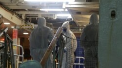 Policija na palubi broda Ruby Princess, travanj 2020.