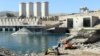 Employees work at strengthening the Mosul dam in northern Iraq on February 3.