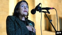 Georgia's President Salome Zurabishvili attends an opposition rally to protest results of the parliamentary elections outside the parliament building in central Tbilisi on October 28.