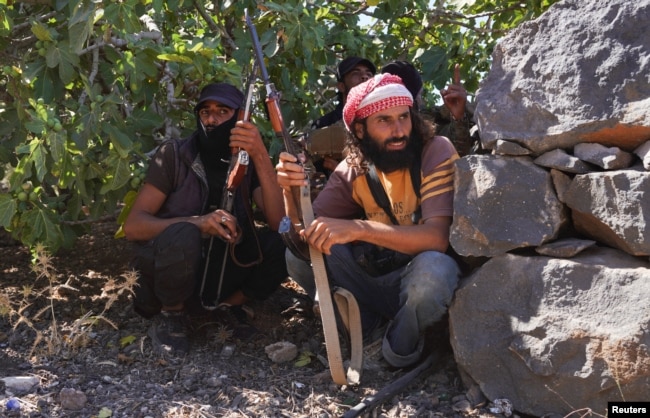 Неизвестные вооруженные боевики на окраине города Эс-Сувайда. Сирия, 15 июля 2025 года