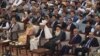 Afghan President Ashraf Ghani and senior political figures attend the opening session of the Loya Jirga on April 29.