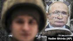 Луганскан кIоштарчу тIом бечу некъаца хIоттийна Оьрсийчоьнан президентан Путин Владимиран мунда
