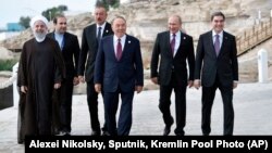 Iranian President Hassan Rohani (left), Azerbaijani President Ilham Aliyev (third from left), Kazakh President Nursultan Nazarbaev (center), Russian President Vladimir Putin (second from right), and Turkmen President Gurbanguly Berdymukhammedov (right) at the Caspian Sea summit in Aqtau earlier this month. 