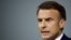 Associated Press a caracterizat drept „sumbră” apariția lui Macron în fața presei, miercuri. 