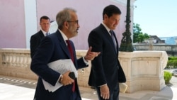 Portuguese Foreign Minister Paulo Rangel (left) and US Secretary of State Marco Rubio leave after their joint press conference and meeting in Lisbon on October 8. 