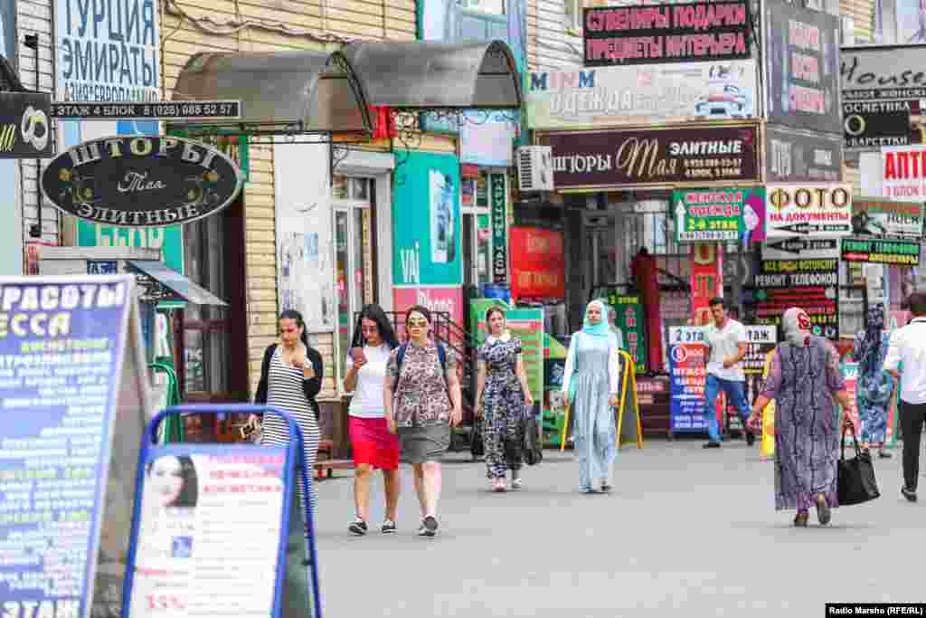 Women in Muslim and secular dress