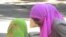 Tajikistan -- Women wearing hijabs