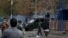 AFGHANISTAN -- Afghan security forces inspect the site of a blast in Kabul, November 12, 2018