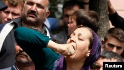Шахтадагы жарылууда жакындарын жоготкондор Эрдогандын өкмөтү кырсыктын алдын ала албаганына, кеч реакция кылганына нааразы болушууда, 14-май, 2014-жыл. 