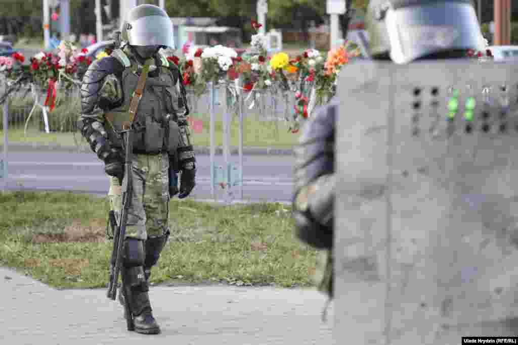 Belarusian security forces guard a street in Minsk on August 11.&nbsp;