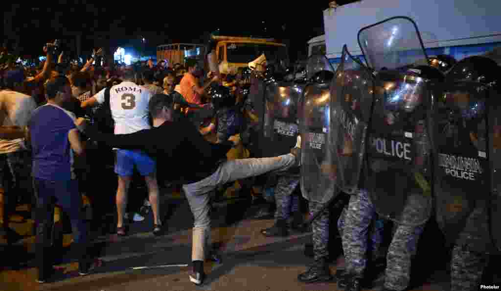 Armenia - Opposition protesters attack riot police in Yerevan, 20Jul2016.