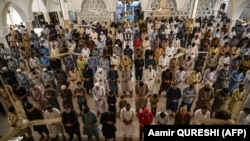 Worshippers offer Jummat-ul-Vida prayers on the last Friday ahead of the Eid al-Fitr festival which marks the end of the Muslim holy month of Ramadan at a mosque in Islamabad on May 22.