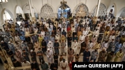 Muslim devotees offer prayers on the last Friday ahead of the Eid al-Fitr festival that marked the end of the Muslim holy month of Ramadan, at a mosque in Islamabad on May 22.
